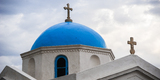 Agios_Nikolaos_blue_domed_church,_the_Town_of_Chora_near_Little_Venice_district._Mykonos_island,_Cyclades,_Agean_Sea,_Greece