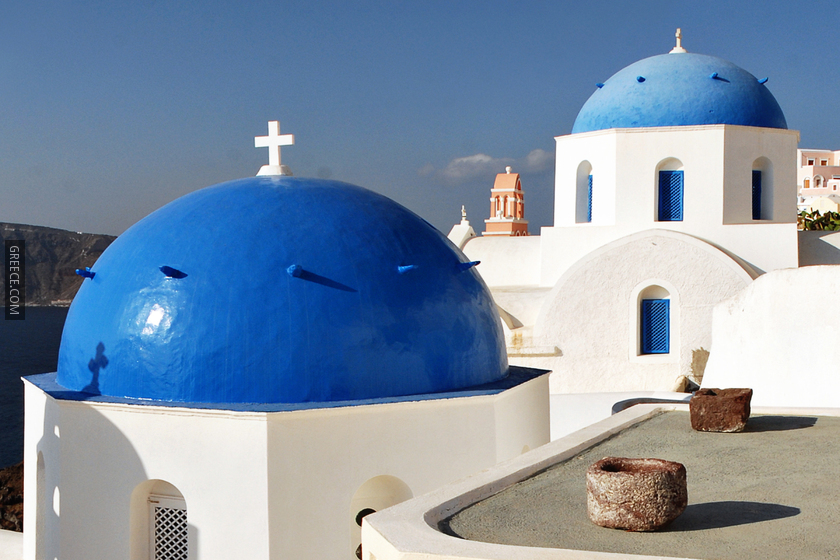 Reknown blue domes of the Church dedicated to St Spirou in Firostefani, Santorini island (Thira), Greece