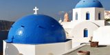 Reknown_blue_domes_of_the_Church_dedicated_to_St._Spirou_in_Firostefani,_Santorini_island_(Thira),_Greece