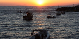 Santorini,_Oia_port,_sunset_(6247349000)